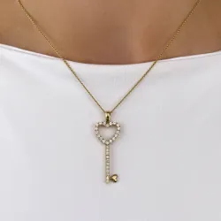 Sleutel diamanten hanger in 14 caraat goud 0,55 ct