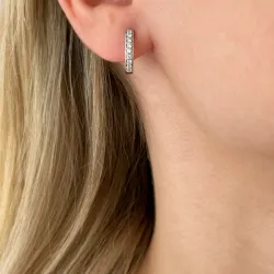 14 mm briljant creool in 14 karaat witgoud met diamant