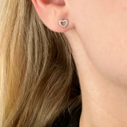 Hart diamant oorsteker in 14 karaat witgoud met diamanten 