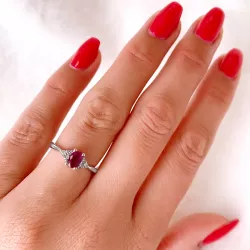 ovale robijn diamant ring in 14 karaat witgoud 0,63 ct 0,10 ct