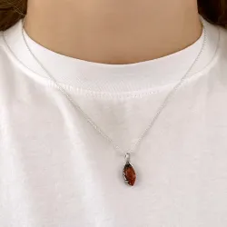 ovaal barnsteen hanger in zilver