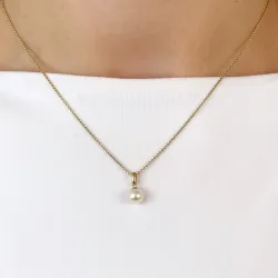 6 mm ivoorwit parel hanger in 9 karaat goud