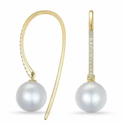parel oorbellen in 9 karaat goud met diamant 
