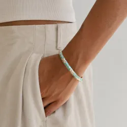 waterproof bloem lichtblauwe bangle in verguld staal - OCEANA