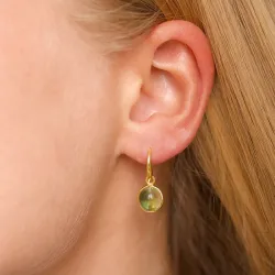 rond lichtgroene kristal oorbellen in verguld zilver - Loom Stones