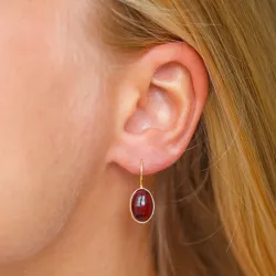 ovaal rode kristal oorbellen in verguld zilver - Loom Stones