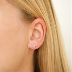 bliksem oorbellen in verguld messing - Eliné