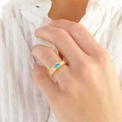 blauwe kristal ring in verguld messing - Eliné