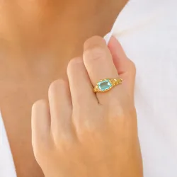 blauwe kristal ring in verguld messing - Eliné
