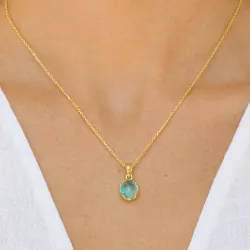 blauwe kristal ketting met hanger in verguld messing - Eliné