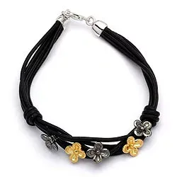 Zwart armband in katoenen met bloemen hanger in verguld en gerhodineerd zilver