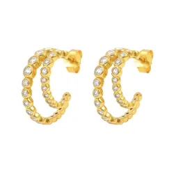 verzamelmonster Kirsten Dyrum halfcreool in verguld sterlingzilver witte zirkoon